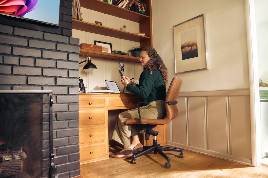 Sarah working from her home office in Singapore